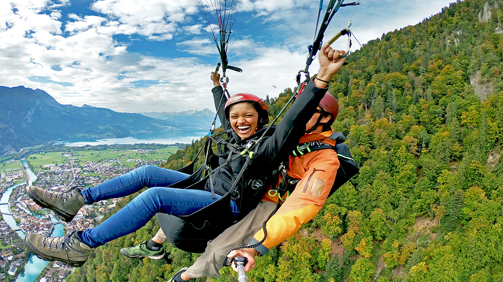 Student Srishti Srivastava paraglides over the Swiss Alps while studying abroad. Student Srishti Srivastava paraglides over the Swiss Alps while studying abroad.